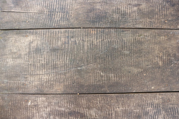 Antigo fundo de madeira texturizado escuro, A superfície da velha textura de madeira marrom, vista superior marrom