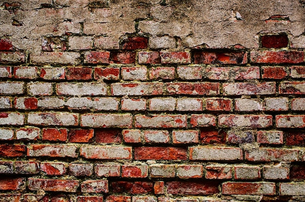 Antigo fundo de textura de grunge de parede áspera de tijolo vermelho antigo