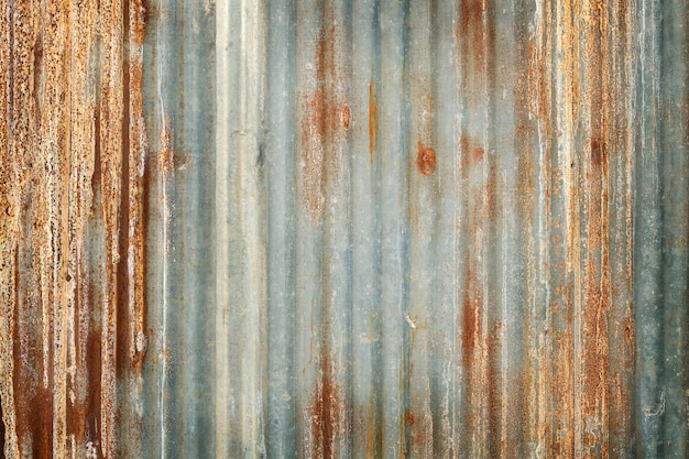 Antigo fundo de textura de parede de zinco enferrujado na chapa de painel de metal galvanizado