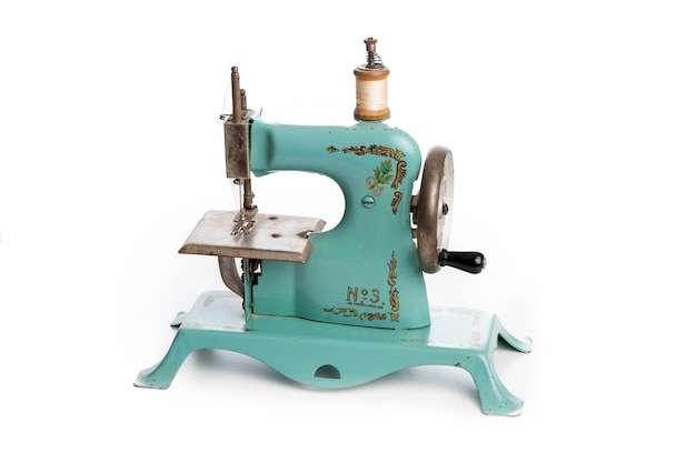 Foto antigua máquina de coser azul