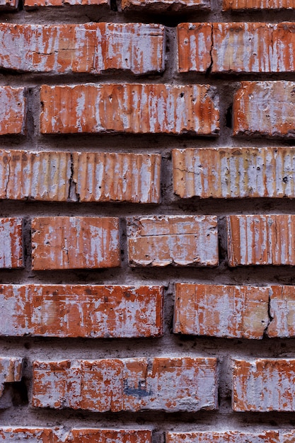 Foto antigua muralla de ladrillo rojo, textura rústica