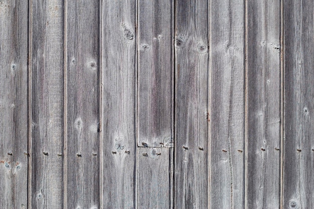 antigua pared de madera con tablones grises verticales
