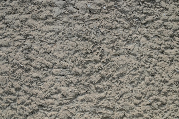 Antigua superficie de cemento erosionado áspero como fondo