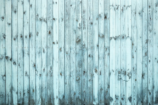 Antigua valla de madera azul