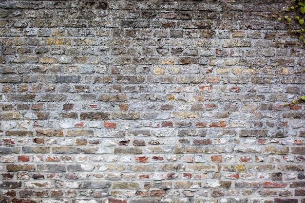 Antiguo fondo de pared de ladrillo gris grunge