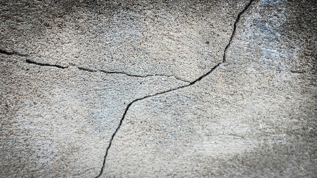 Antiguo muro de piedra con una grieta. textura para el diseño