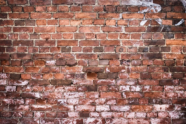 Antike Ziegelwand Vintage Textur aus roten Steinblöcken als Hintergrund