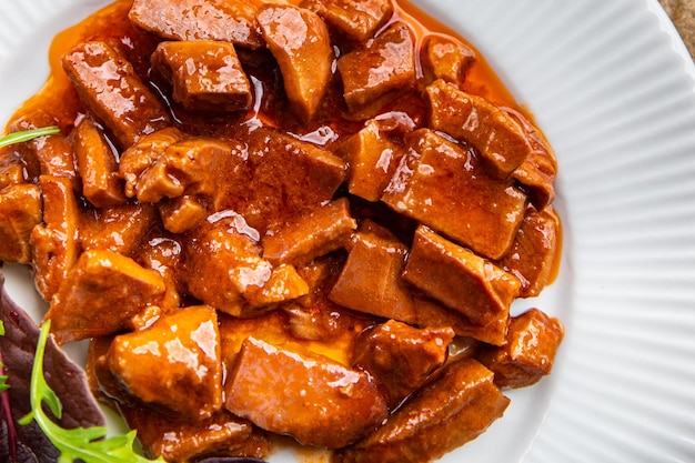 Antipasti Tintenfisch Tomatensauce Aperitif Essen Meeresfrüchte Salat Mahlzeit Snack auf dem Tisch kopieren