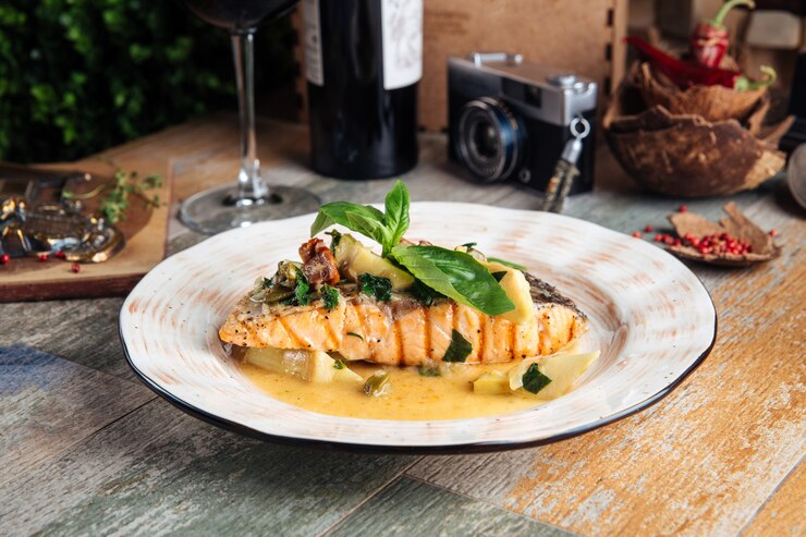 Foto apetitoso filete de salmón gourmet con salsa cremosa