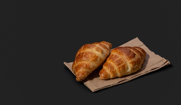 Appetitliche Croissants auf schwarzem Hintergrund