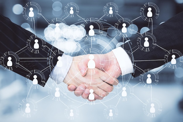 Un apretón de mano con la interfaz global de recursos humanos