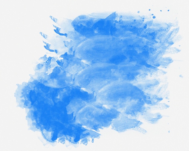 Foto aquarela azul sobre fundo branco a cor espirrando no papel