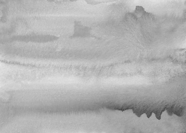 Aquarellgraue Flecken auf Papierhintergrundbeschaffenheit. Monochromes graues Overlay. Abstrakte Aquarellschwarzweiss-moderne Malerei.