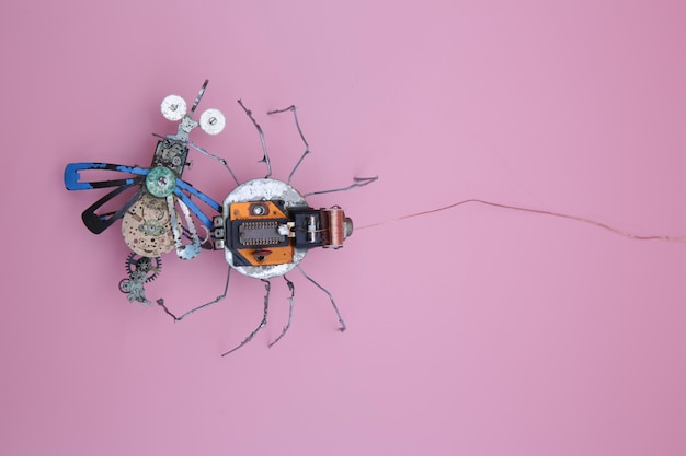 Foto una araña robot ataca a una mosca robot