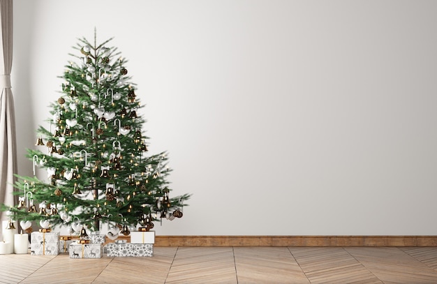 Foto Árbol de navidad decorado en una habitación vacía