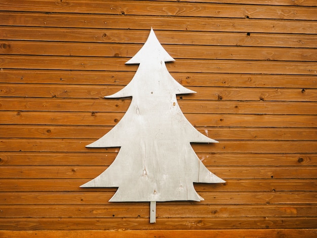 Foto Árbol de plata sobre un fondo de madera.