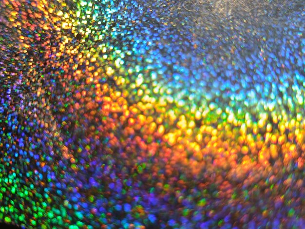 Foto arco iris brillante con fondo abstracto borroso