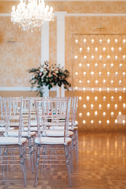 Foto Área de ceremonia de boda, decoración de sillas de arco.