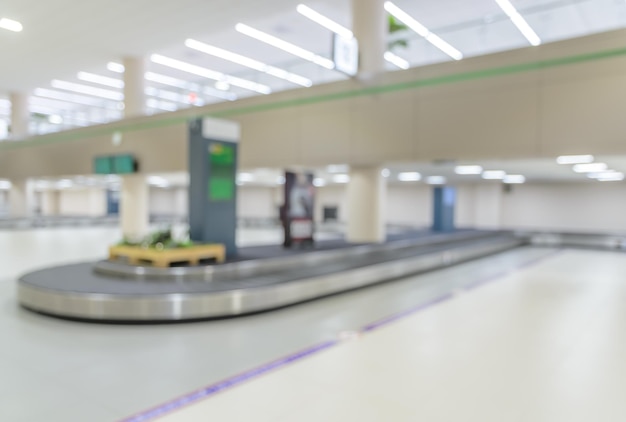 Foto Área de recogida de equipaje borrosa del aeropuerto