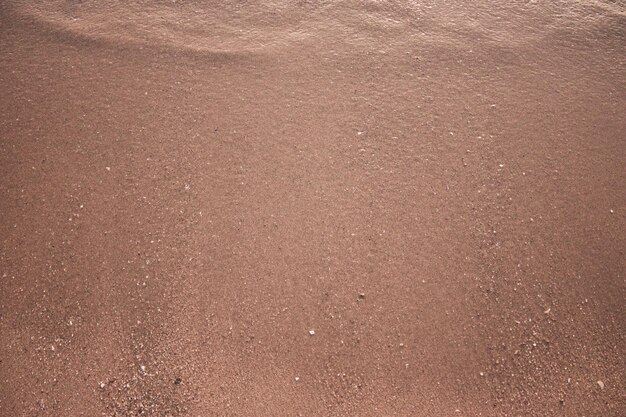 areia da praia Depois que as ondas passaram