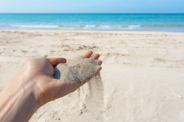 Areia na mão