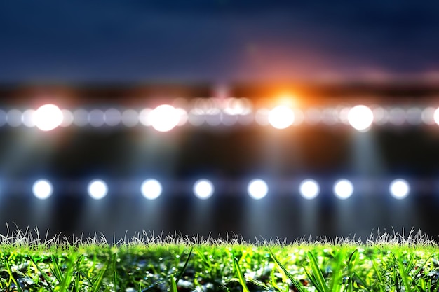 Foto arena de futebol em luzes e flashes, close-up, plano de fundo