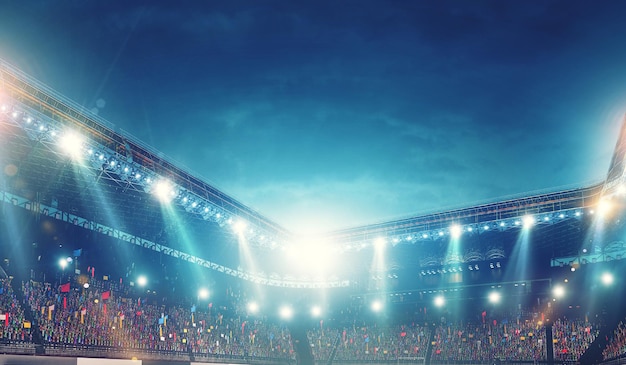 Arena de fútbol de noche llena de luces y destellos