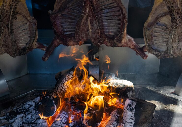 Foto argentina patagônia el calafate restaurantes que oferecem carne assada parilla grelhada lentamente cozida