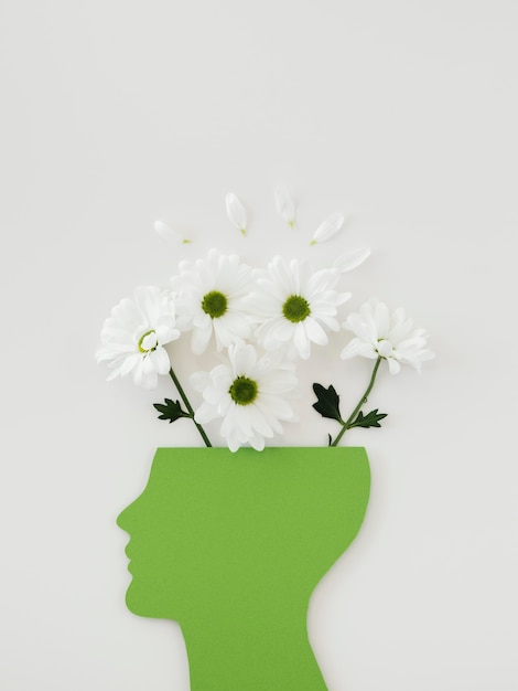Arreglo del concepto de optimismo con flores.
