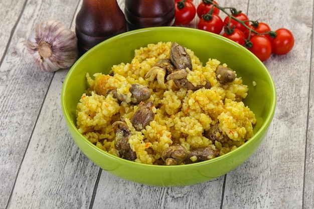 Arroz com corações de frango