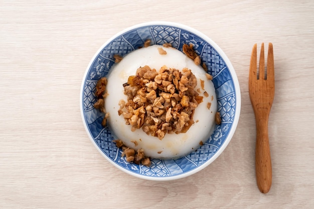 Arroz con leche salado taiwanés Wa gui con rábano seco picado y salsa de soja