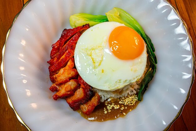 Foto arroz porco vermelho de hong kong