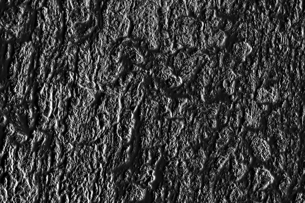 El arte abstracto del grunge negro adorna el fondo de la textura de la pared