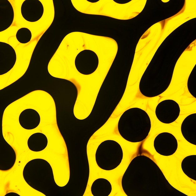 Arte abstrata. Redemoinhos, design artístico com cores de óleo preto e amarelo formando incríveis estruturas intrincadas com ferrofluido.