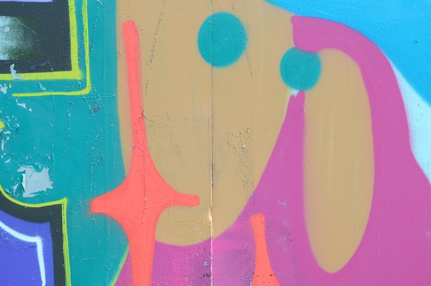 Arte callejero Imagen de fondo abstracta de un fragmento de una pintura de graffiti coloreada en colores de moda