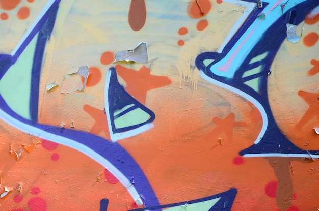 Arte callejero Imagen de fondo abstracta de un fragmento de una pintura de graffiti coloreada en tonos beige y naranja