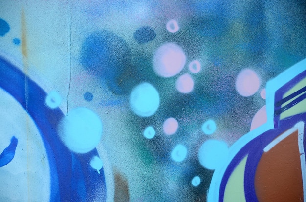 Arte callejero Imagen de fondo abstracta de un fragmento de una pintura de graffiti coloreada en tonos cósmicos azules y violetas