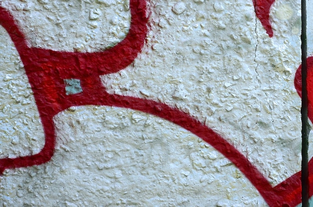 Arte de rua imagem de fundo abstrata de um fragmento de uma pintura de graffiti colorida em cromo e vermelho