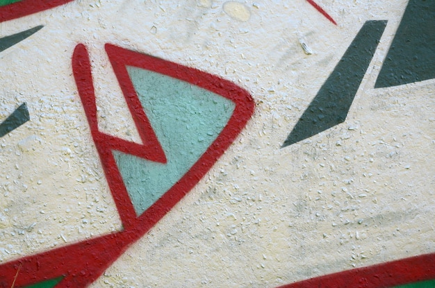 Arte de rua Imagem de fundo abstrata de um fragmento de uma pintura de graffiti colorida em tons de cromo e vermelho