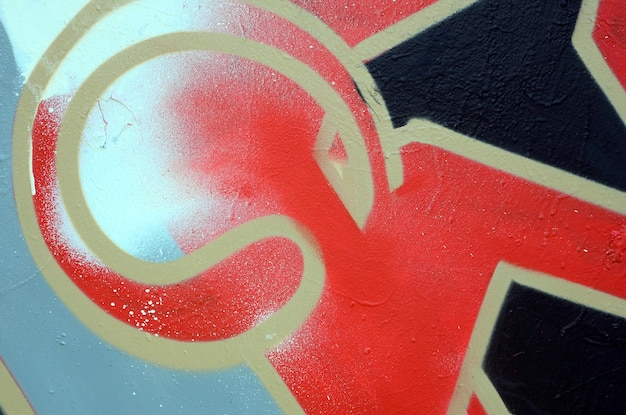 Arte de rua Imagem de fundo abstrata de um fragmento de uma pintura de graffiti colorida em tons vermelhos