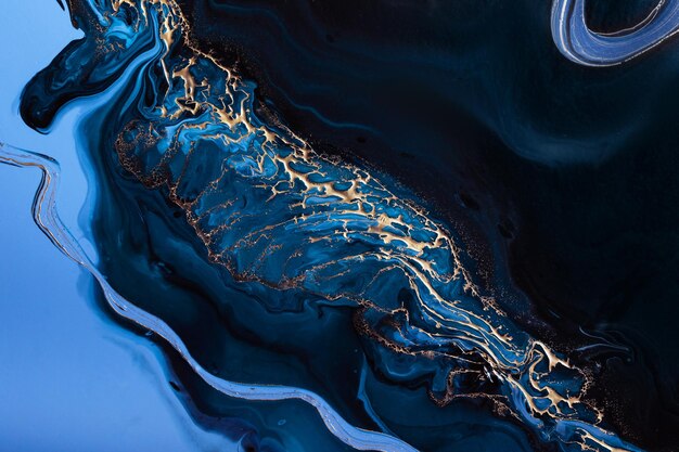 Arte Fluida Acrílica Onda dourada de partículas e transbordos azuis Fundo de pedra abstrato