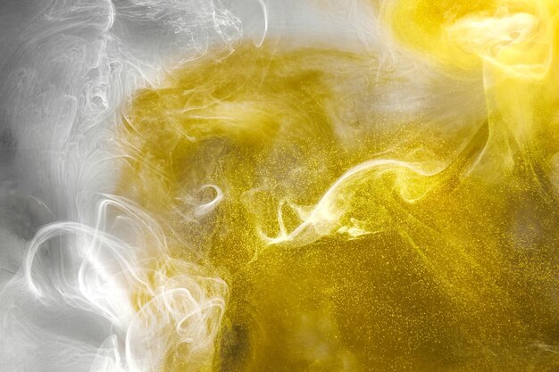 Arte fluida líquida Fundo abstrato Branco amarelo dançando tintas acrílicas espaço subaquático fumaça oceano