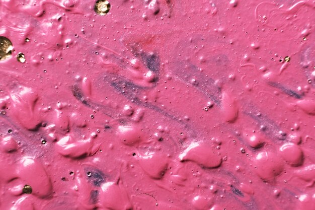 Arte fluido Abstracción de pintura de burbujas Fondo de pintura rosa con baches táctiles o primer plano de textura