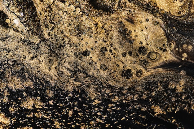 Arte líquida de fundo abstrato de luxo Mistura de tinta de ouro preto manchas de tinta de álcool textura de mármore Padrão de impressão moderno