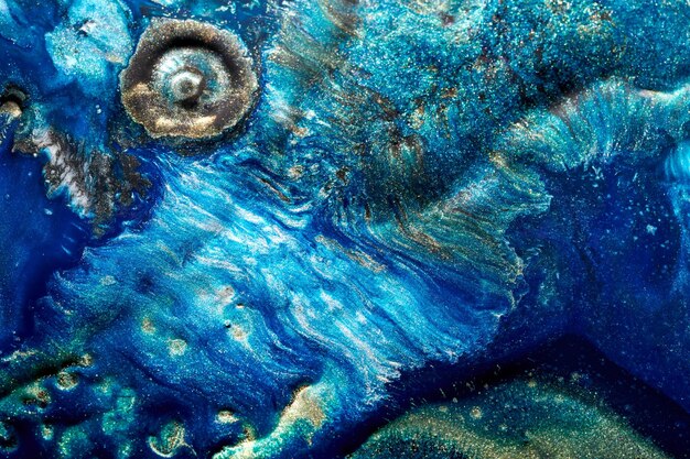 Arte líquida de fundo abstrato de luxo Tinta de álcool azul com manchas de tinta dourada textura de mármore da superfície da água