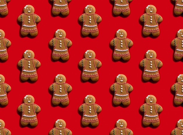 Arte rojo fondo de patrones sin fisuras panadería comida decoración marrón jengibre mujer galleta con blanco