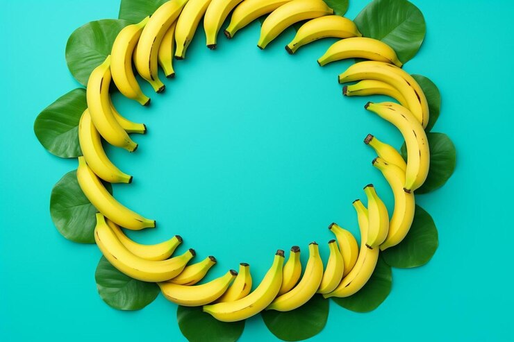 Foto artículos escolares de temática plátano formando marco redondo