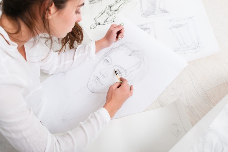 Foto artista acabado retrato a lápiz humano en el piso