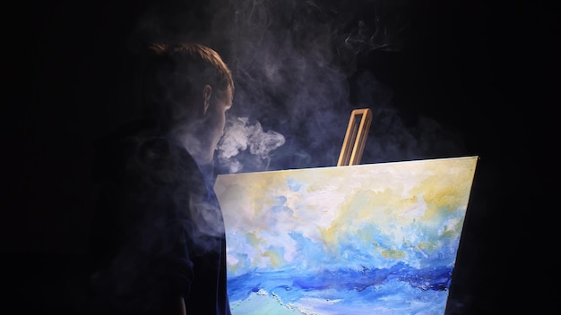 Artista copista pintar paisaje marino con barco en el océano Vaper humo vape ecigarette Artesano decorador dibujar como barco navegar en el mar azul con color acrílico