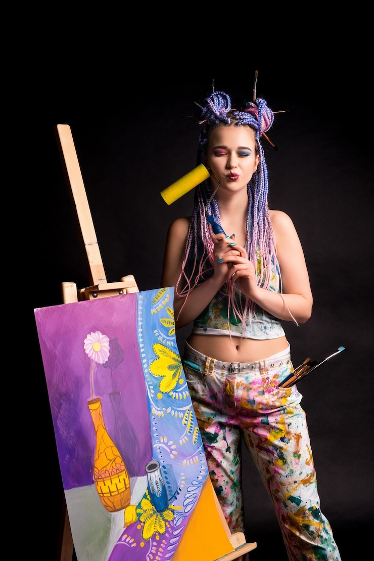 Foto artista elegante cerca del caballete con pintura